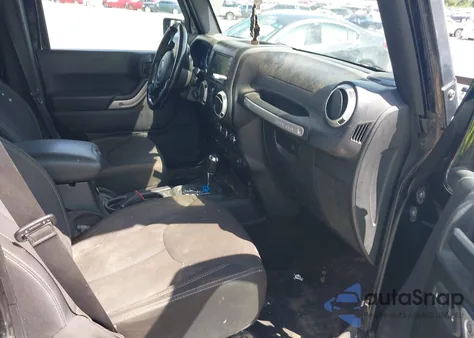 2015 Jeep Wrangler Unlimited Sahara z USA, uszkodzony, nr VIN 1C4BJWEG1FL655886